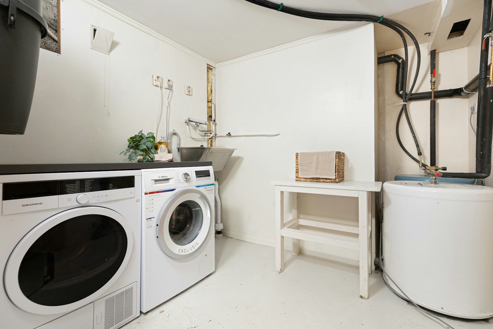 A washer and dryer in a laundry room