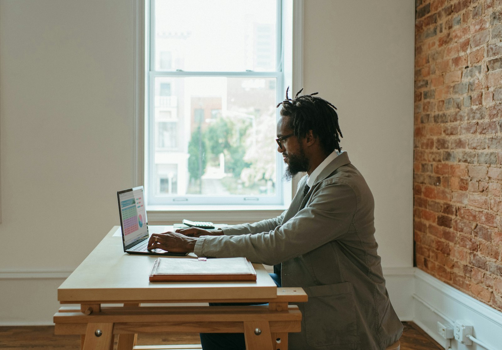 An Australian sole trader working at a desk
