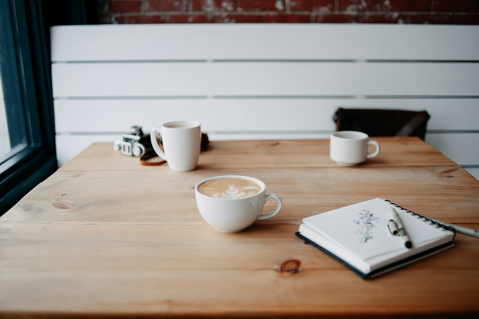 Two cups of coffee on a table
