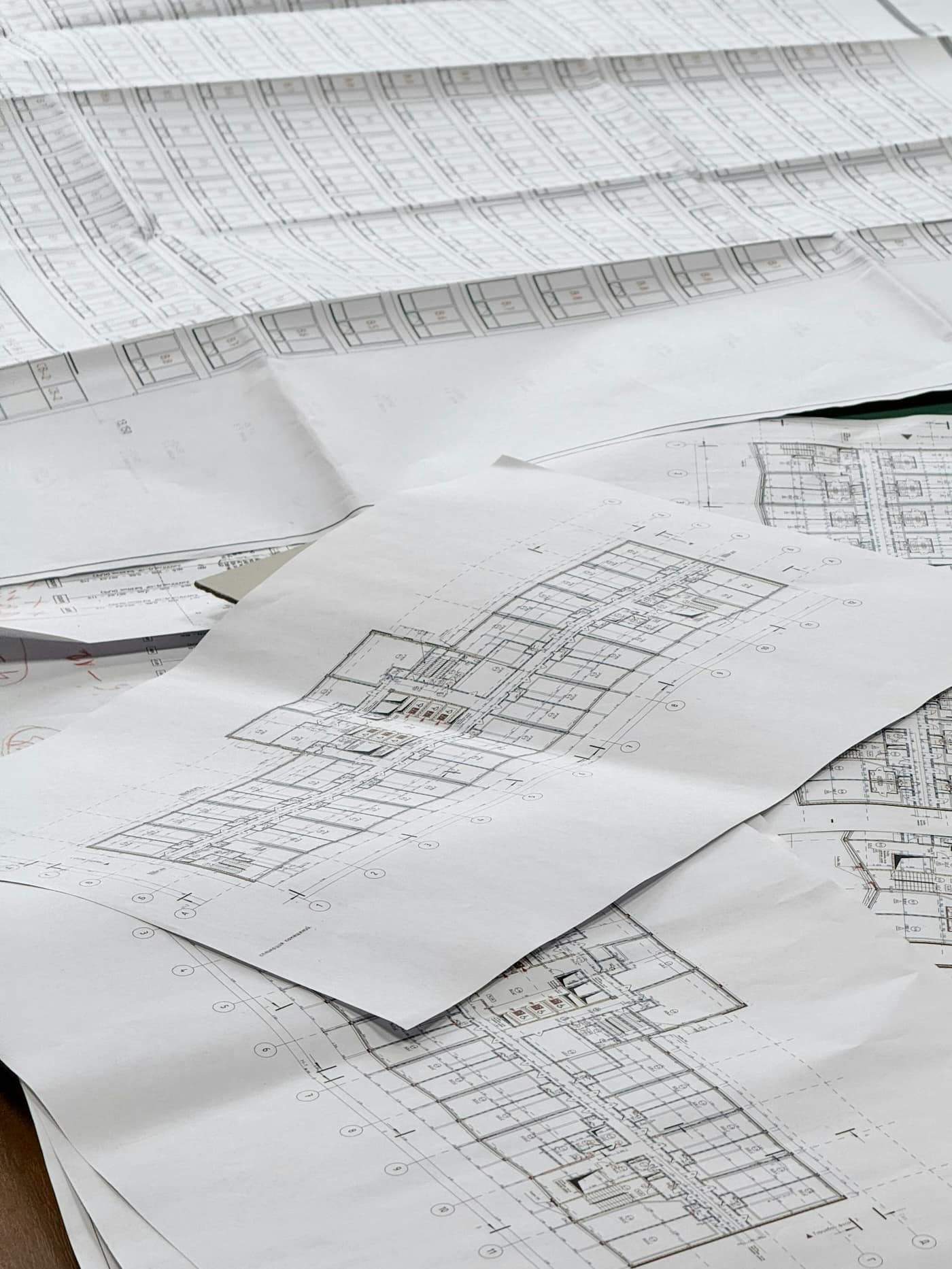 Architectural blueprints and plans on a table