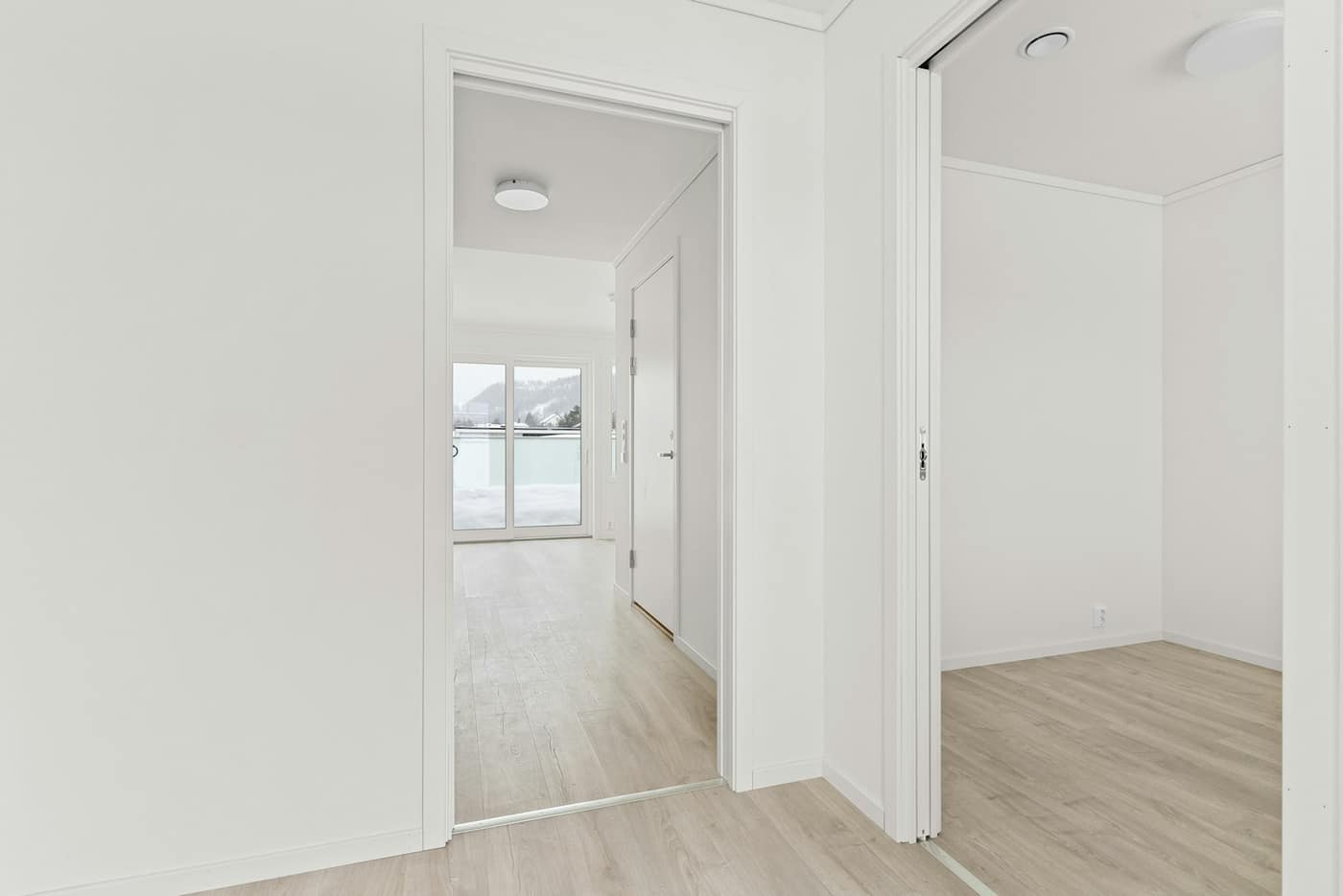 An empty room with freshly painted white walls