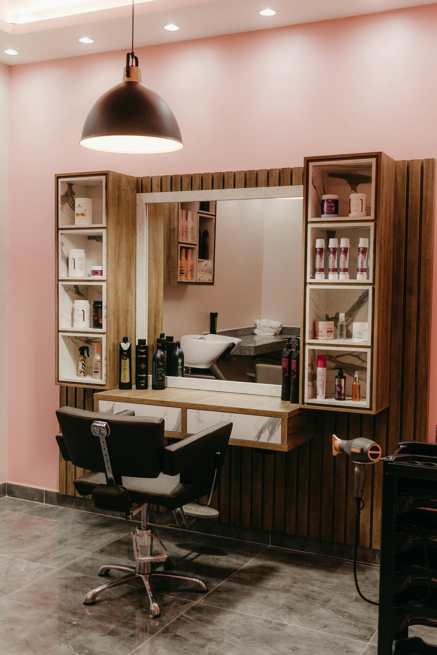 A styling chair and mirror in a salon