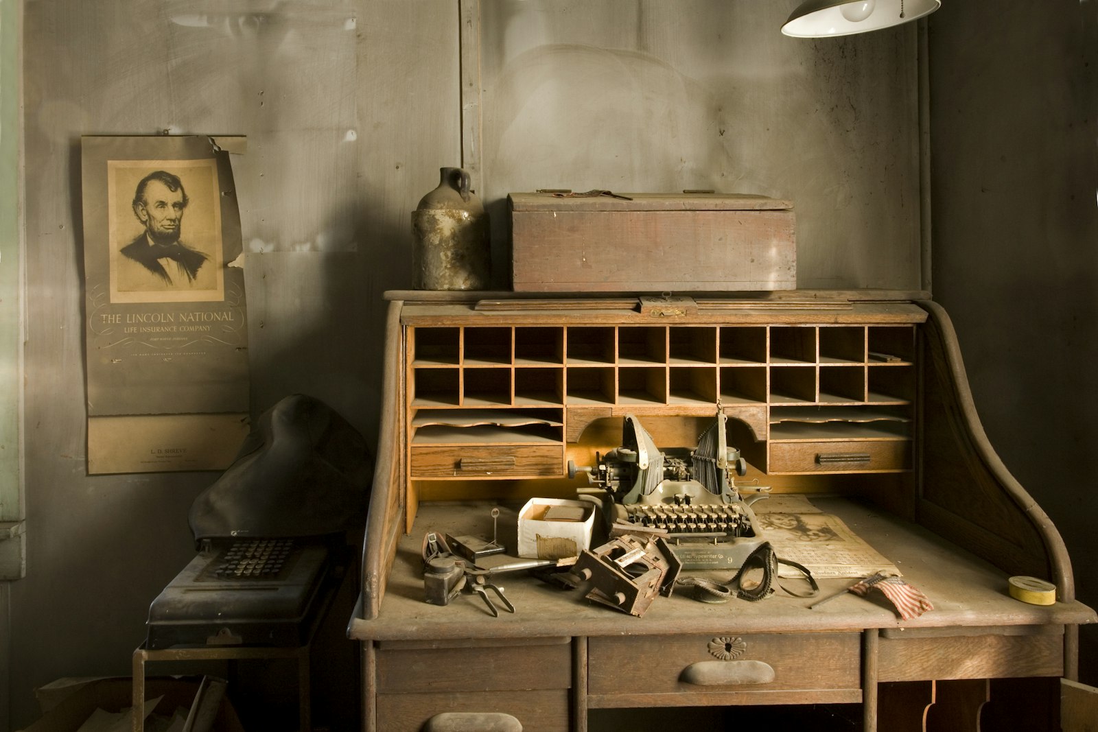 A typewriter on a wooden desk